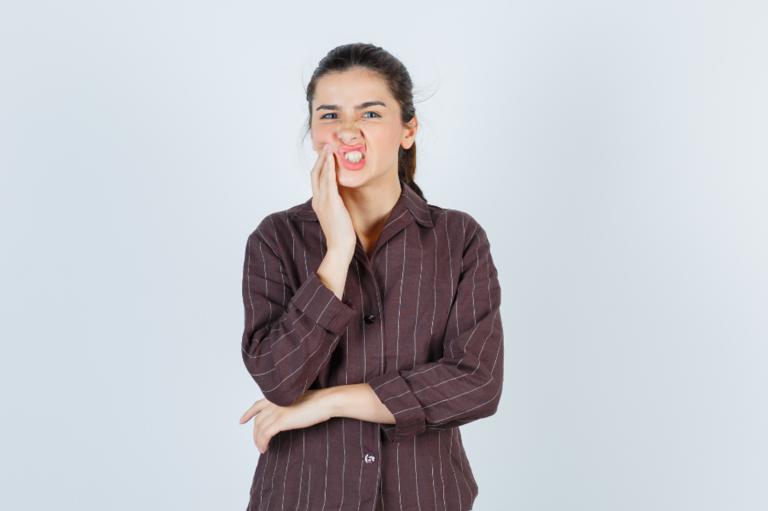 Why Some People Experience Tooth Pressure While Biting Why Some People Experience Tooth Pressure While Biting